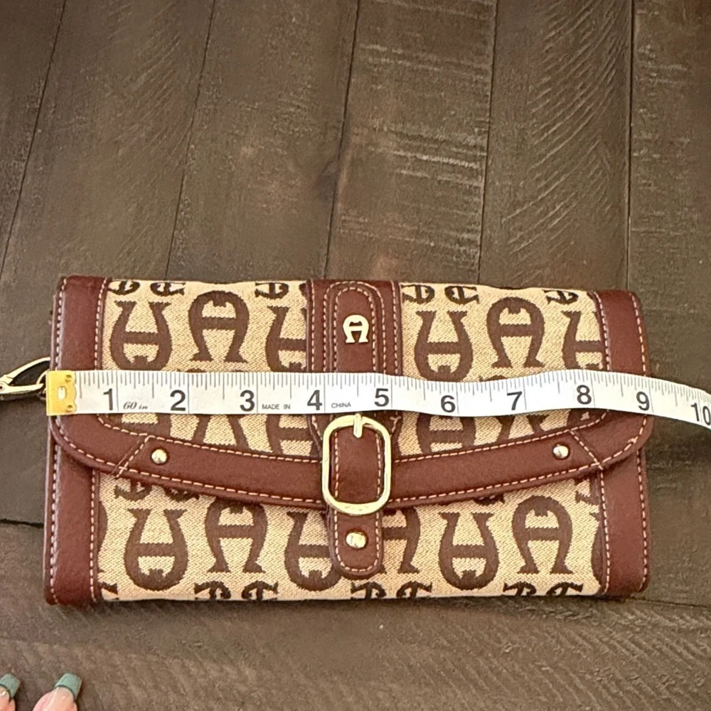 Etienne Aigner Brown and Cream Logo Wristlet